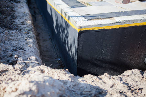 Professional Waterproofing technician working in Chicago, IL